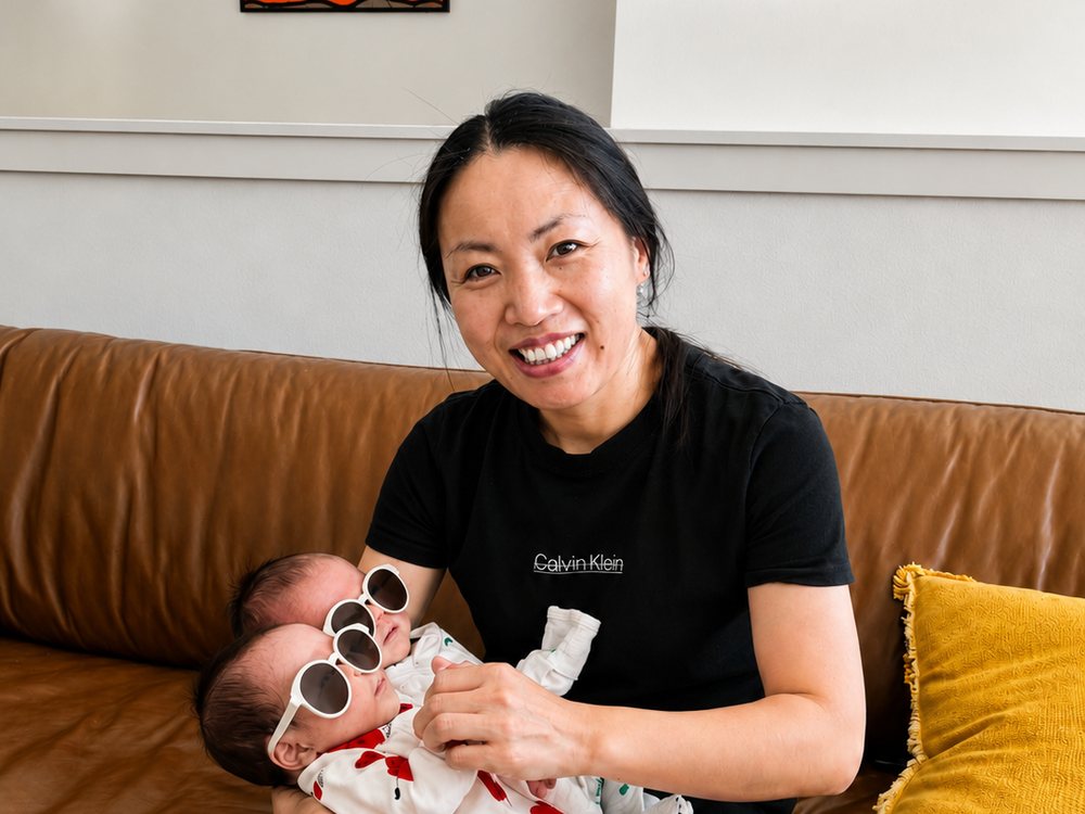 Rainy holding newborn twins