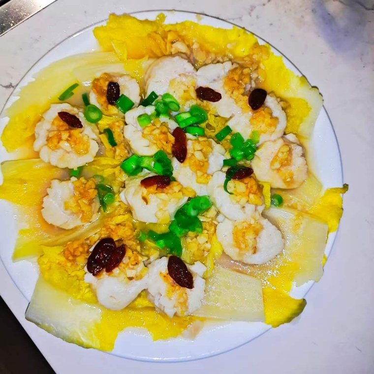 Confinement meal: steamed fish with goji berries and napa cabbage