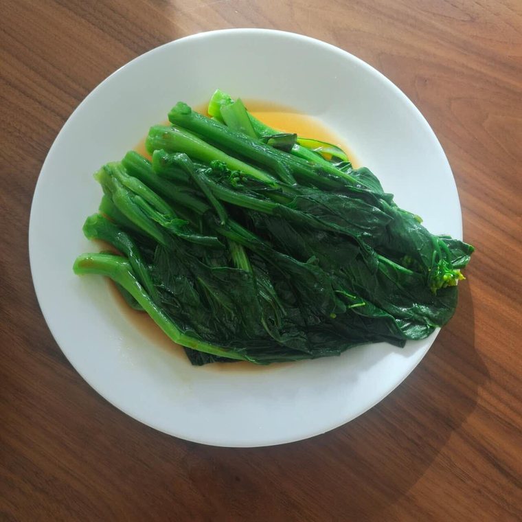 Blanched Chinese greens in a light broth